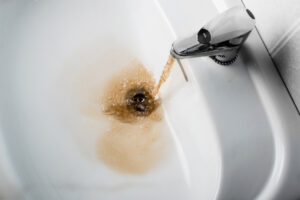 Dirty, brown water coming out of a faucet in an El Paso home.